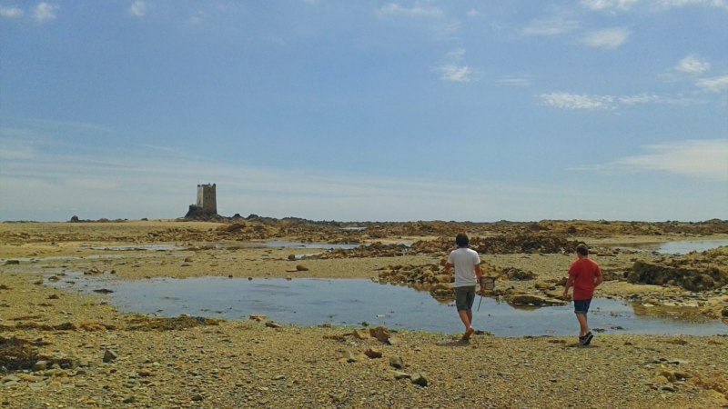 Walking to the cache at low tide