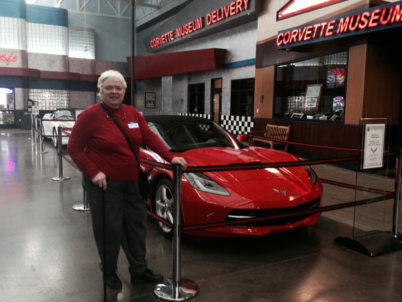AbbysGrammy admired this 2014 Torch Red Convertible displayed at the lobby while awaiting pickup from its owners, Jim & Kay Gooderham.