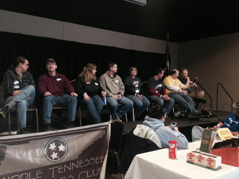 The area reviewers who attended were bold enough to take the stage to answer questions from the audience, as well as to give tips and advice on how best to submit appropriate geocaches. Pictured from left to right are: Doctor Teeth (KY), IronHorseReviewer (KY), Bluegrass Reviewer (KY), Thunder-Chicken (KY), TheScarlettReviewer (IL), Hoosier Reviewer, (IL), NCreviewer (NC) and Dogwood_Reviewer (NC). Serving as emcee and working the crowd was The Seanachai (TN), not pictured.